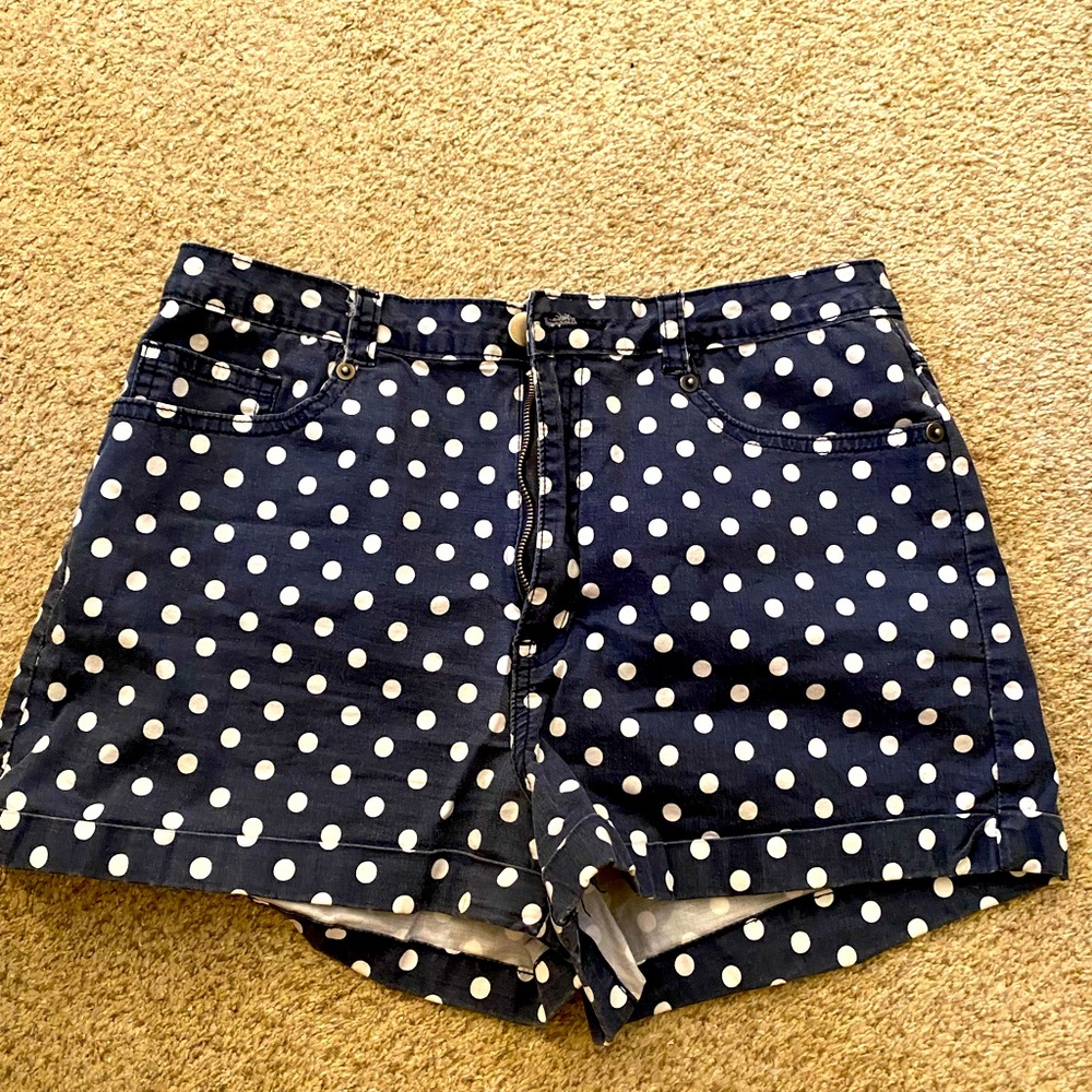 High waisted blue polka dot shorts.